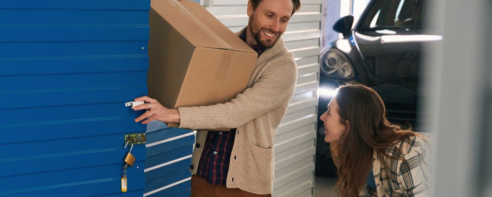 A homeowner getting access to a self storage unit and smiling